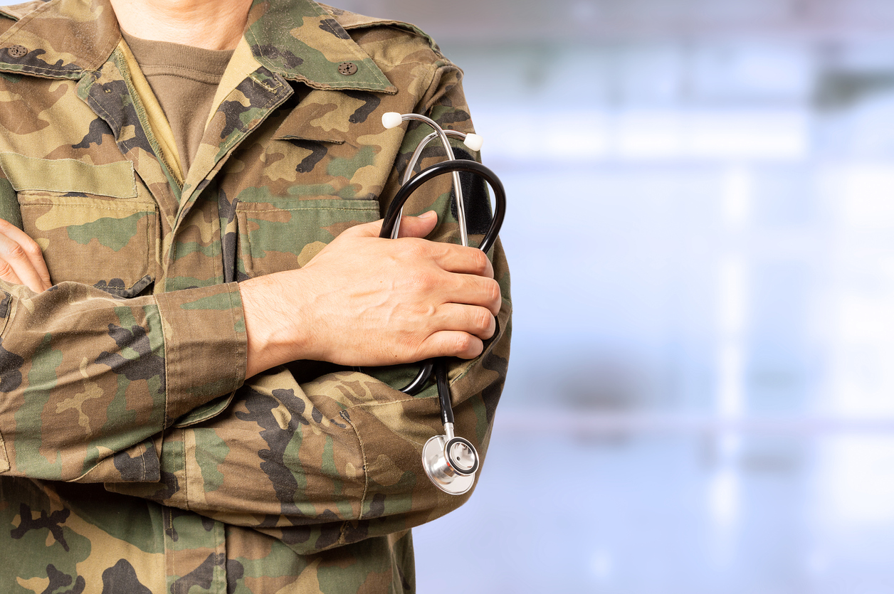 military doctor with crossed arms at a hospital